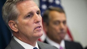 House Majority Leader Kevin McCarthy of Calif., left, accompanied by outgoing House Speaker John Boehner of Ohio, speaks during a new conference on Capitol Hill in Washington, Wednesday, Oct. 7, 2015, following the weekly House Republican conference. The Houses most hard-edged conservatives are trying to keep McCarthy from inheriting the Speaker post from Boehner once he steps down. (AP Photo/Evan Vucci)